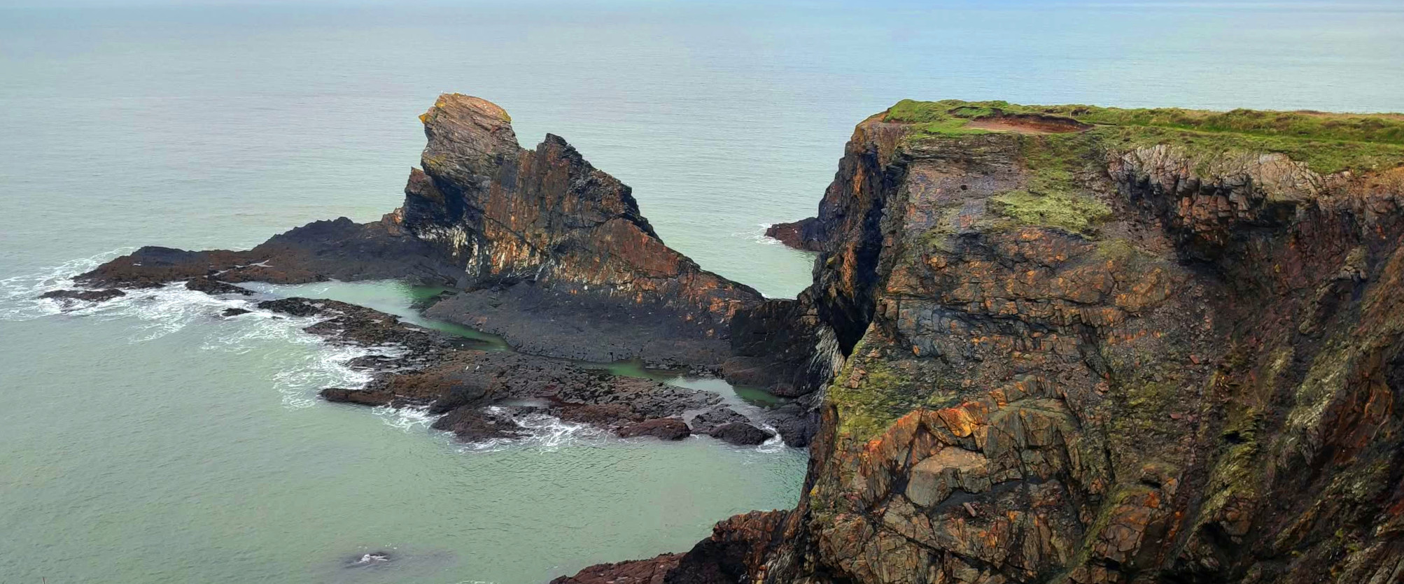 Coastal path above the sea in West Wales, lifestyle photo for local web designer