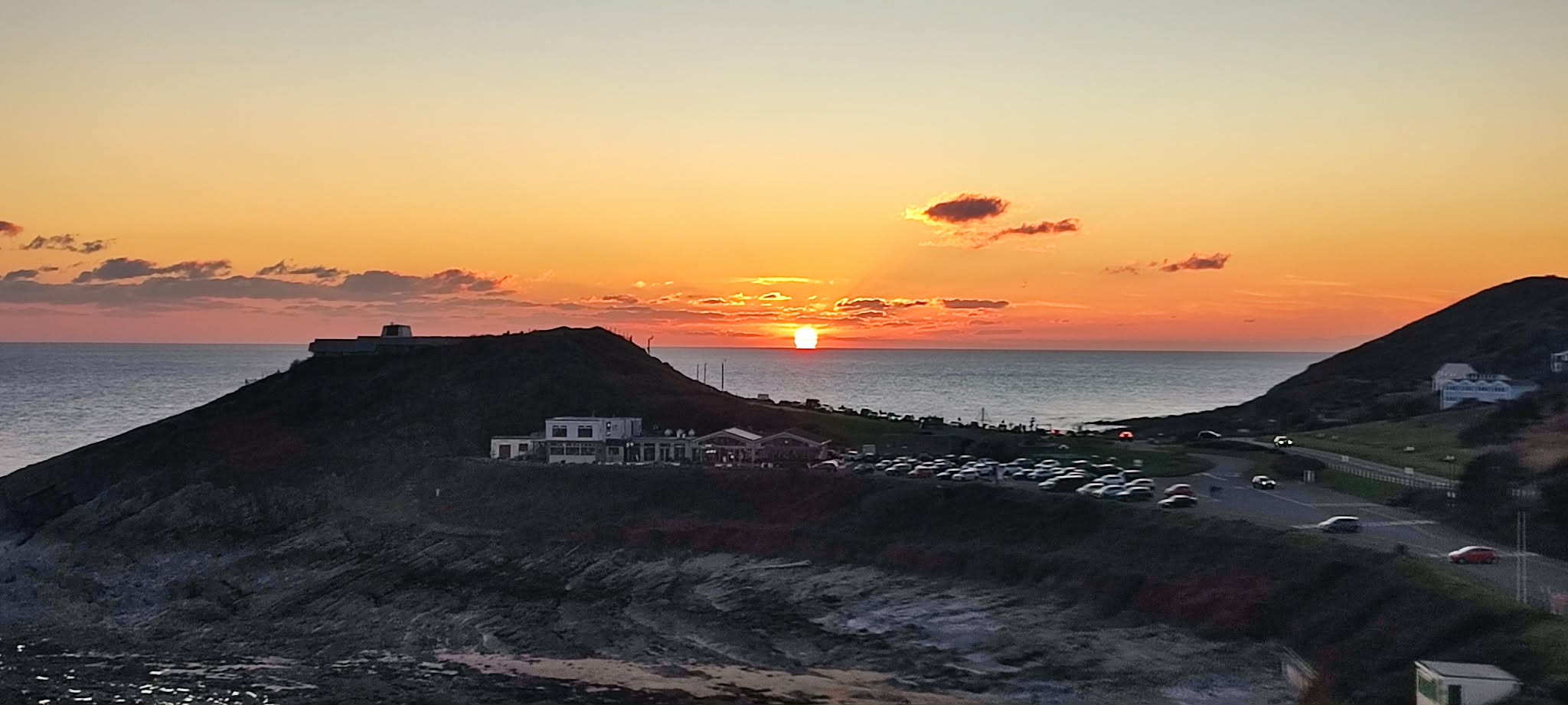 Sunset over the West Wales coastline near Swansea, used on West Coast Digital web design site
